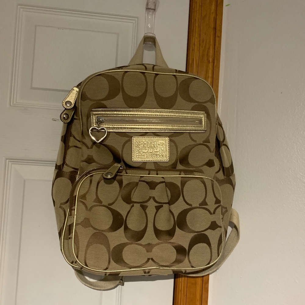 gold coach book bag